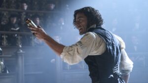 Oscar Isaac stands powerfully.