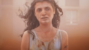 A young girl of maybe 15 or 16 looks upset