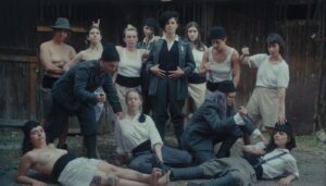 Actors recreate a photo of Italian revolutionary soldiers in a faintly ridiculous way