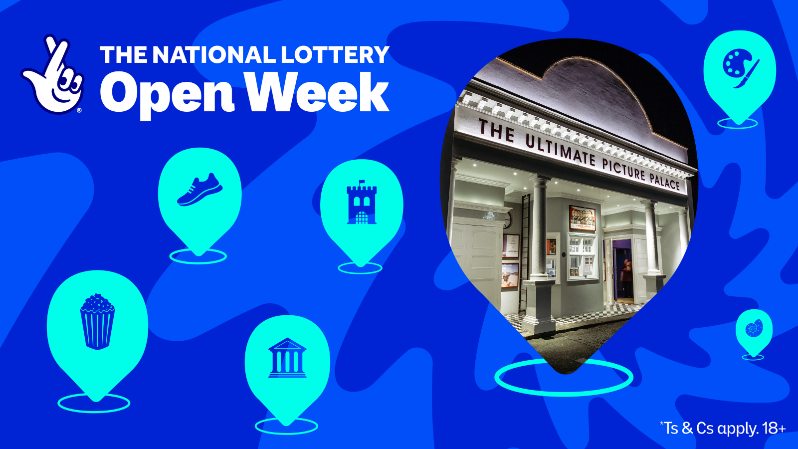 A Malian man sitting in a field in front of an orange tree.